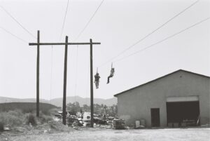 Putting up electric lines. 