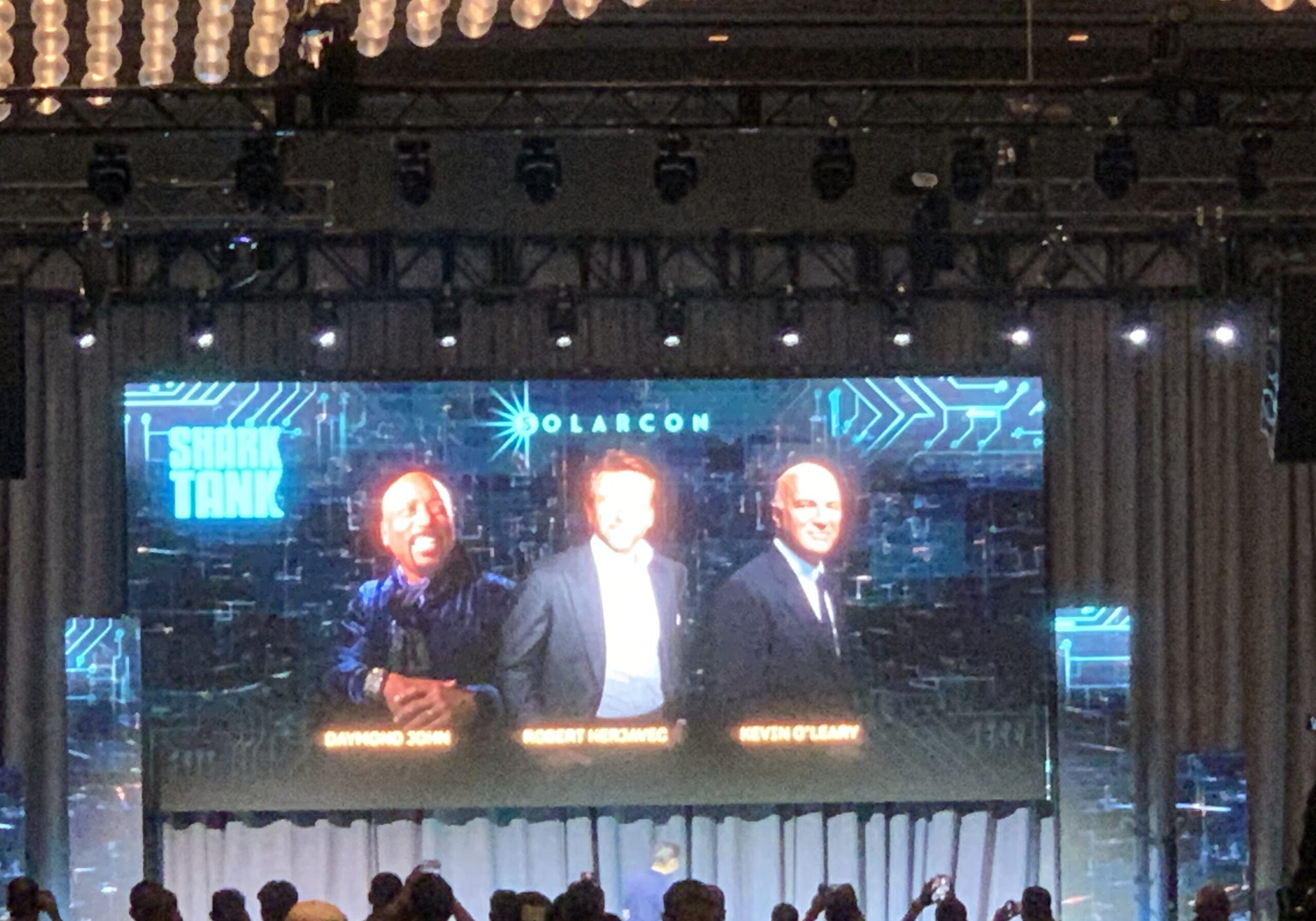 SolarCon, sharks addressing the crowd.